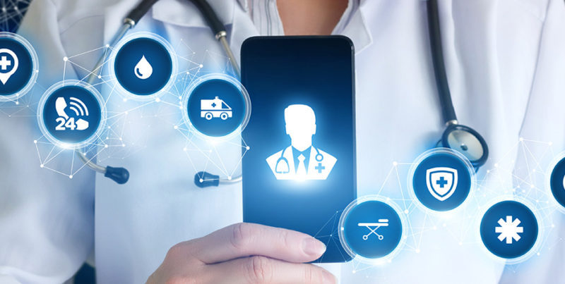 Doctor holding phone with an icon of a doctor on it