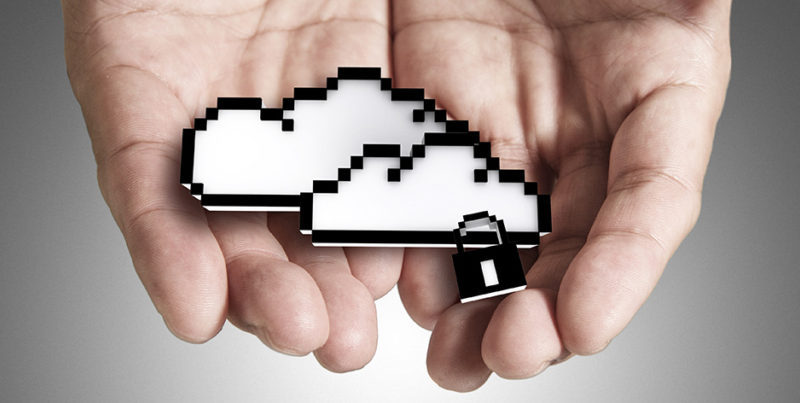 Hands holding graphic of two white clouds with a lock symbol