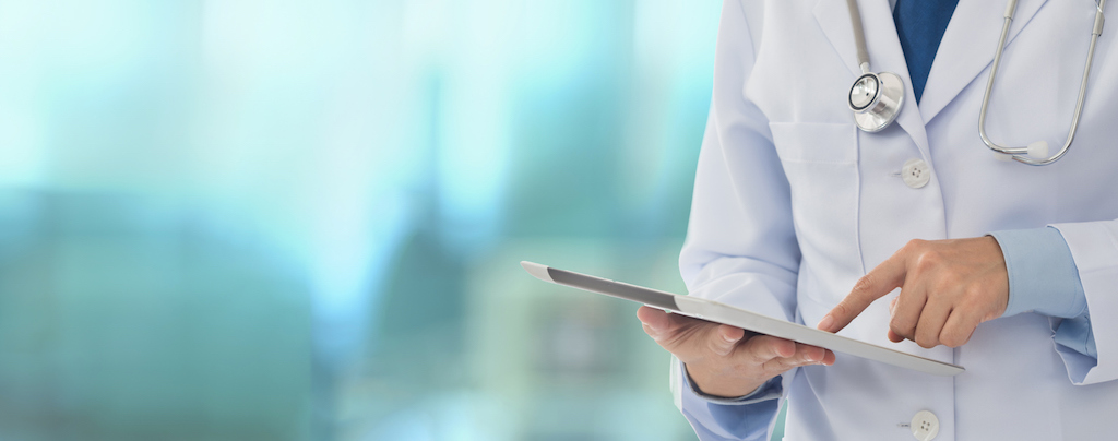 Doctor using digital tablet find information patient medical history at the hospital. Medical technology concept